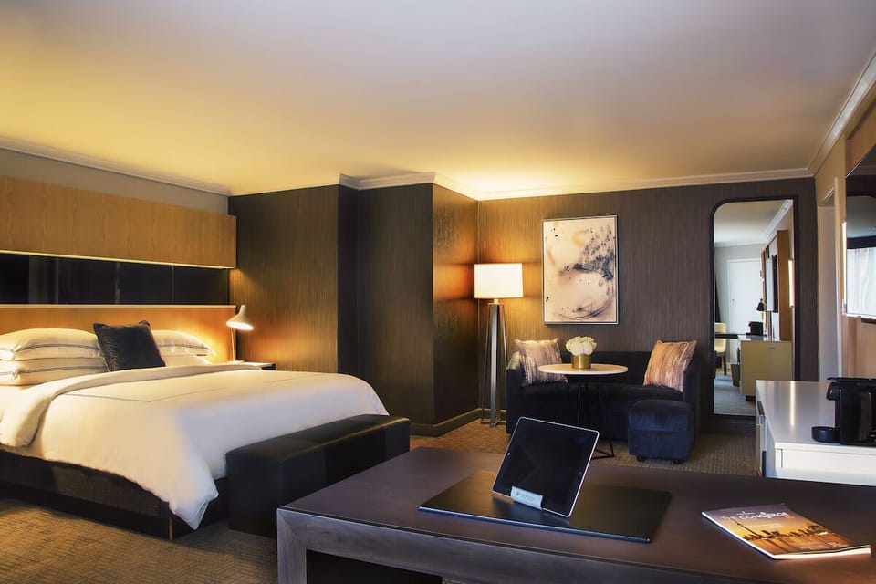 Unit with 1 King bed. Exact unit will be assigned upon arrival. Views, colors, and decor may vary.