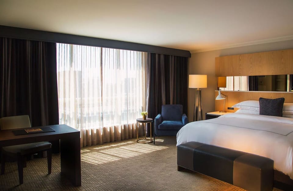 Unit with 1 King bed. Exact unit will be assigned upon arrival. Views, colors, and decor may vary.