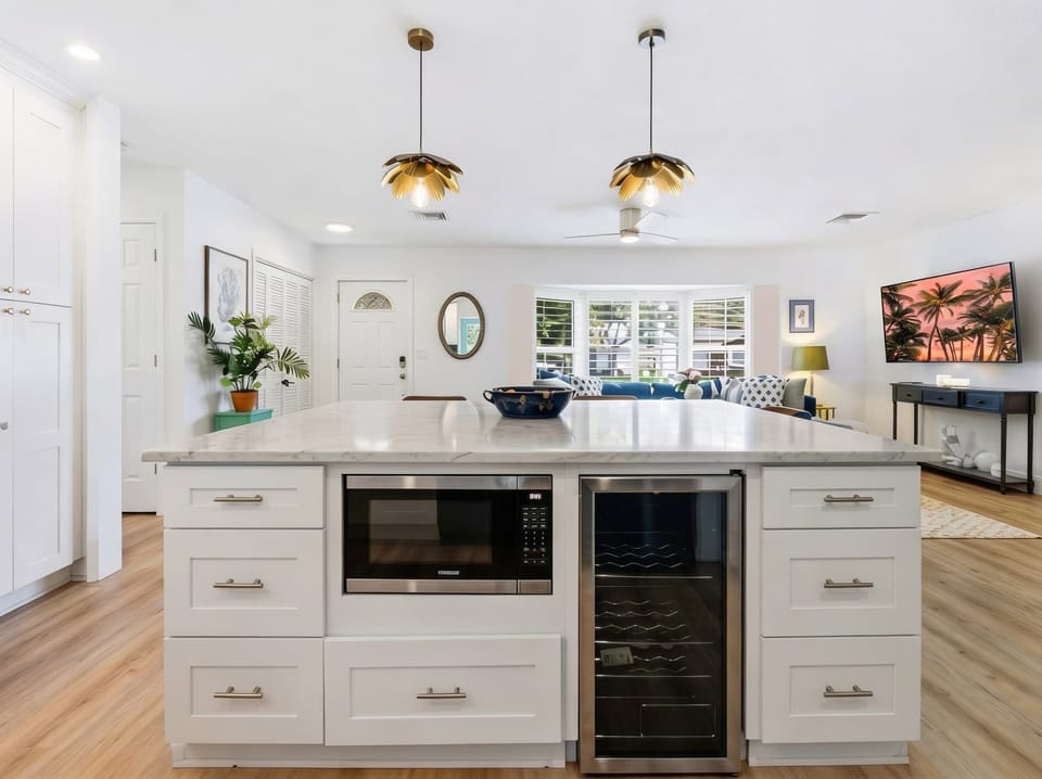 Bright chef’s kitchen with a built-in wine fridge for effortless entertaining