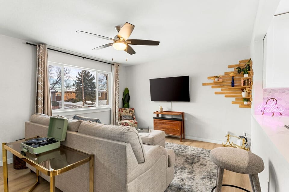 Comfortable Living Space with Smart TV, Flooded with Natural Light