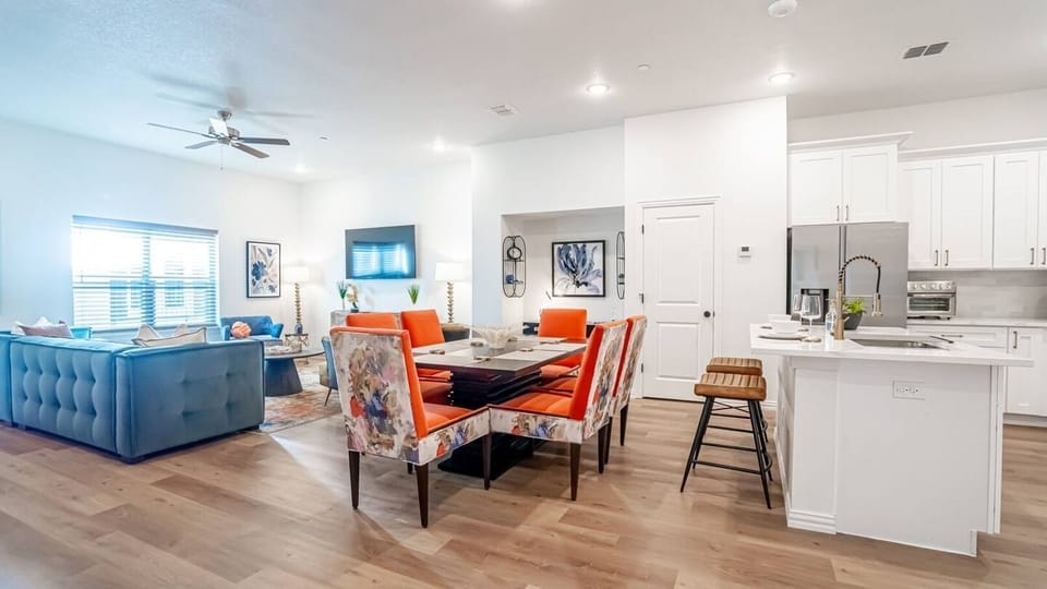 Gather around and eat like you live here. The dining area seats your whole group and flows seamlessly into the full kitchen — ideal for group travel, family stays, and anyone who wants more than a hotel room near Globe Life Field.