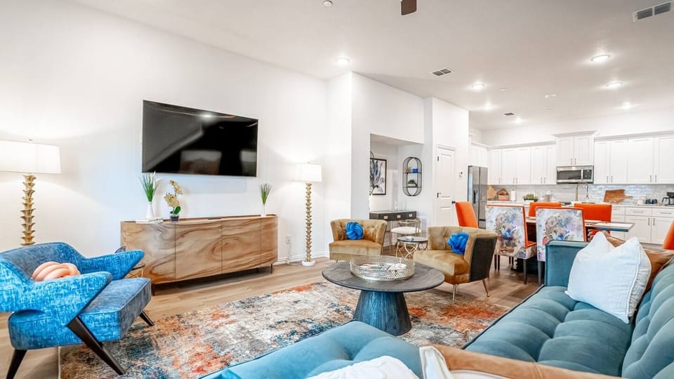 Kick back in a stylish, open-concept living space designed for comfort and connection. Whether you're debriefing after a Rangers game, watching pre-game coverage on the smart TV or just relaxing with your crew—The Ryan's living area has you covered.