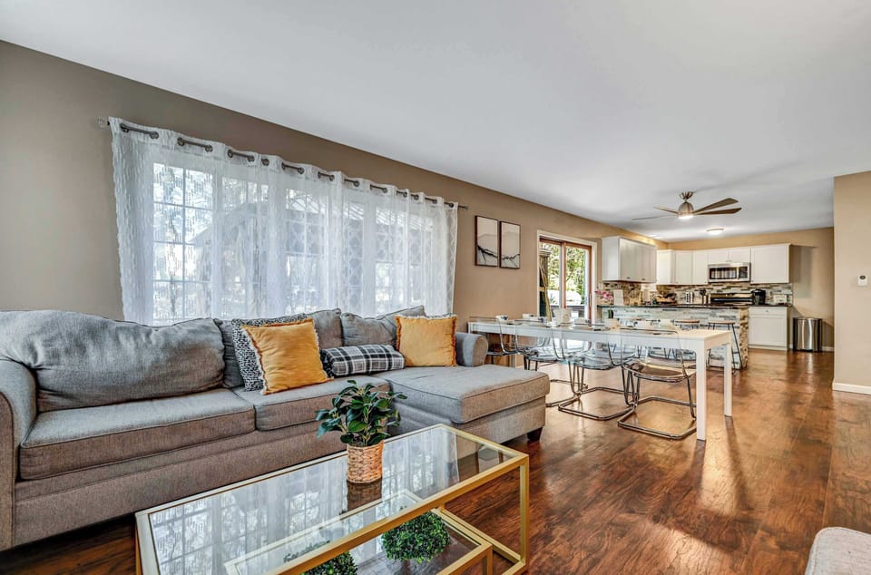 Spacious & Inviting! A warm and modern living area that flows into the kitchen, ideal for quality time and shared meals.