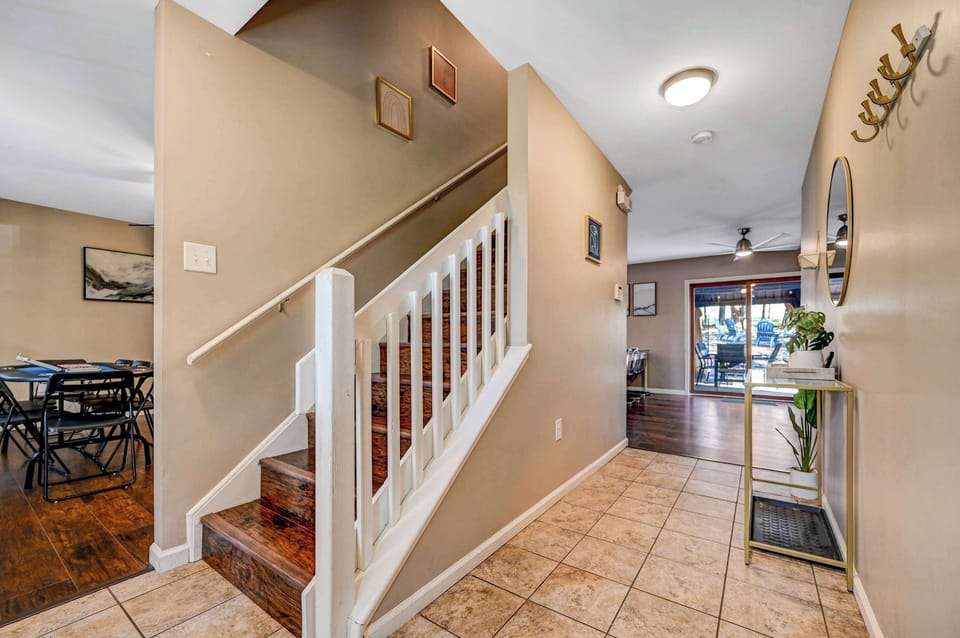 Welcoming First Impression! This stylish and functional entryway provides the perfect start to your stay, organized, bright, and inviting!