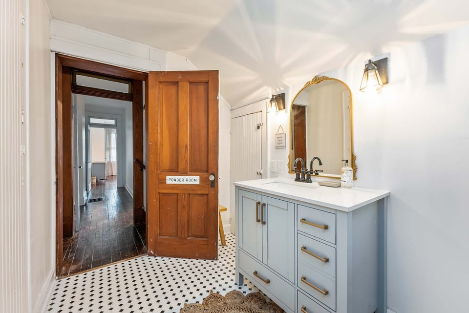 A single vanity & shower/soaking tub combo await in Unit 94’s full bath