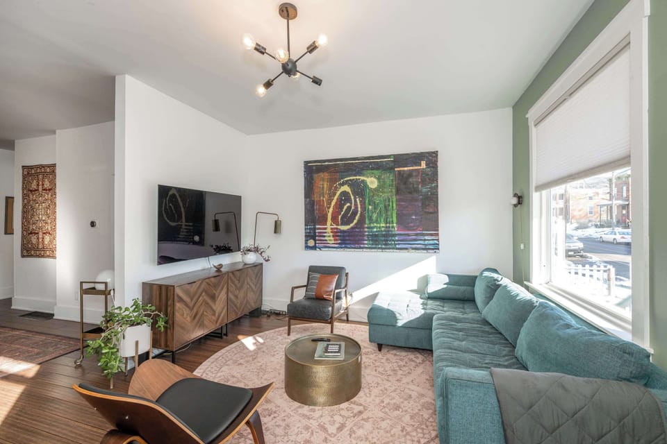 Unwind in the chic living room & stream your favorites on the smart TV