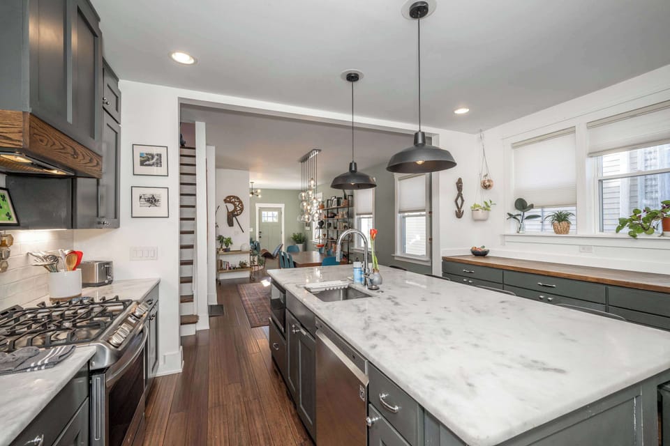 The elegant, open kitchen offers ample space & all the comforts of home