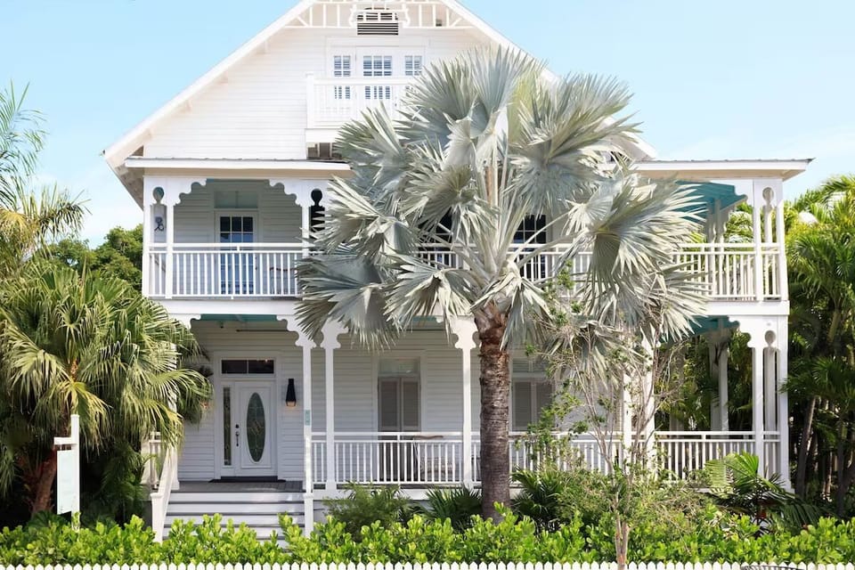 Arrive in style at your breezy, palm-framed retreat.