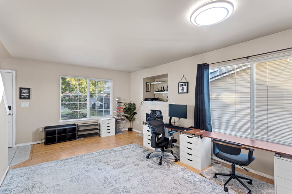 other living room designed for work from home or gaming