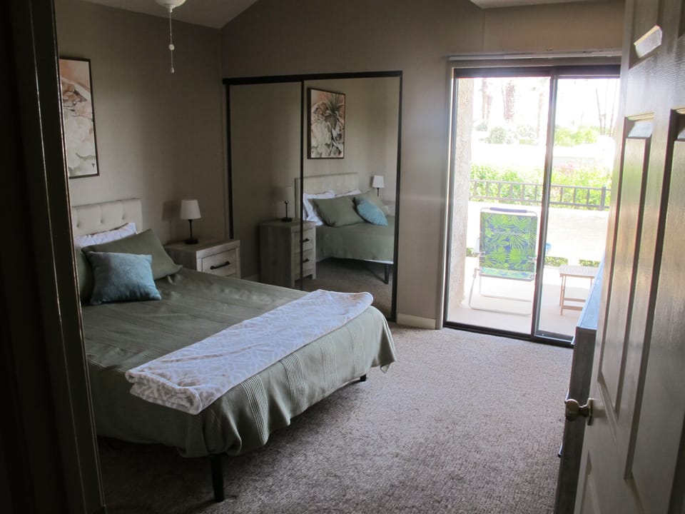 Bedroom 2 has access to back patio