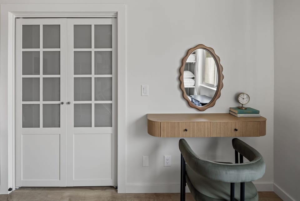 Bunk room has vanity station and spacious closet