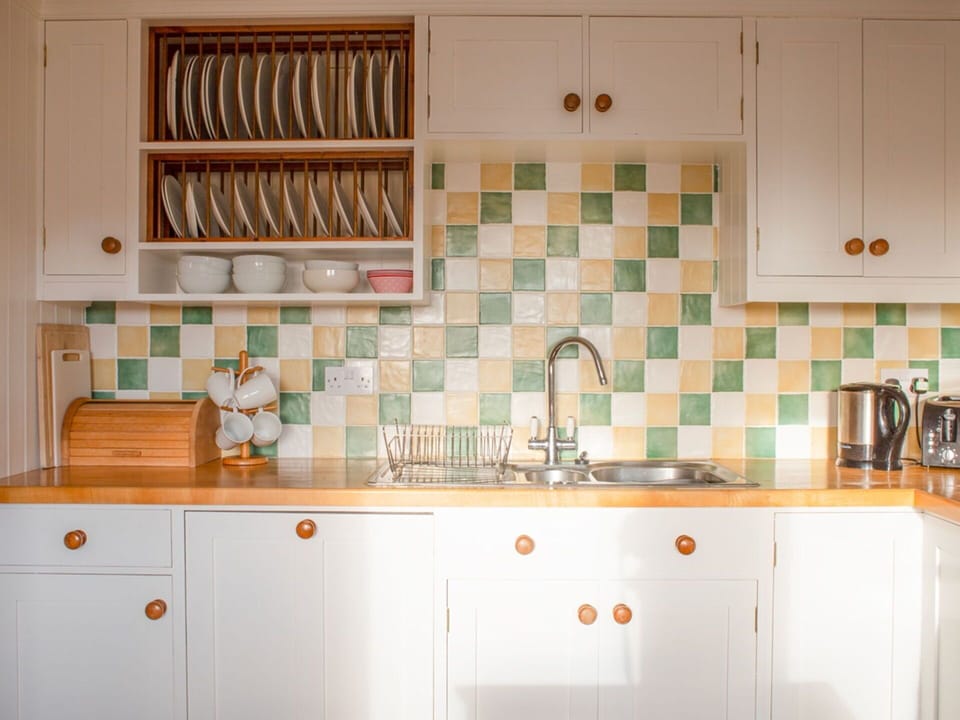 Kitchen, Interior Design, Flooring, Countertop, Fruit, Cabinetry, Tile, Kitchen Appliance, Paint