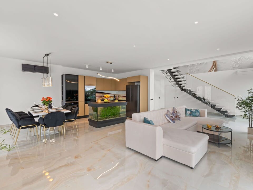 Interior Design, Flooring, Floor, Furniture, Wood, Ceiling, Living Room, Couch, Wood Flooring, Lighting