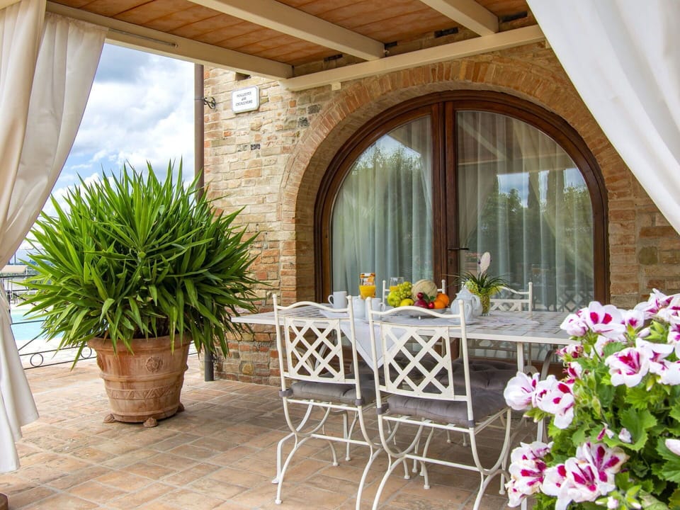 Furniture, Chair, Table, Interior Design, Flooring, Kitchen & Dining Room Table, Floor, Outdoor Furniture, Flowerpot, Houseplant