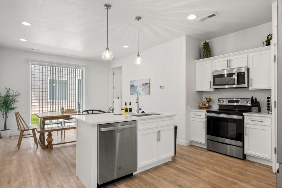 Open kitchen with island and dining area
