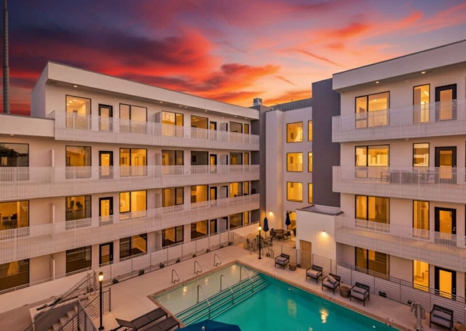 Urban Oasis  — Private balcony with direct views and easy access to the community pool