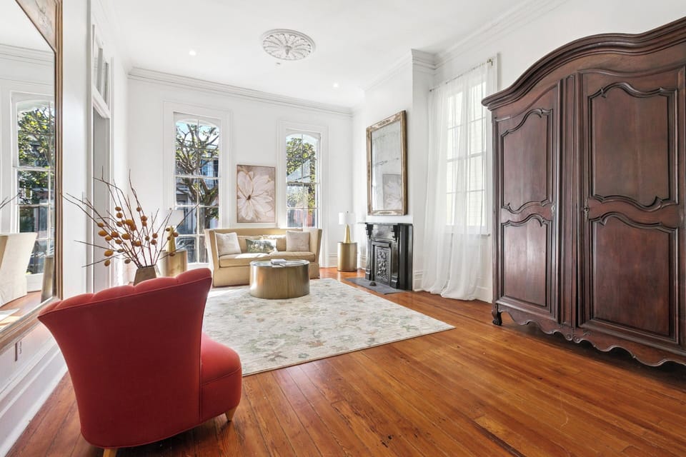 Elegant, formal living room, light-filled space with 13 foot ceilings. 
