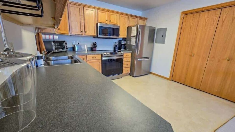 Fully equipped kitchen with modern appliances, induction cooktop, and everything you need.