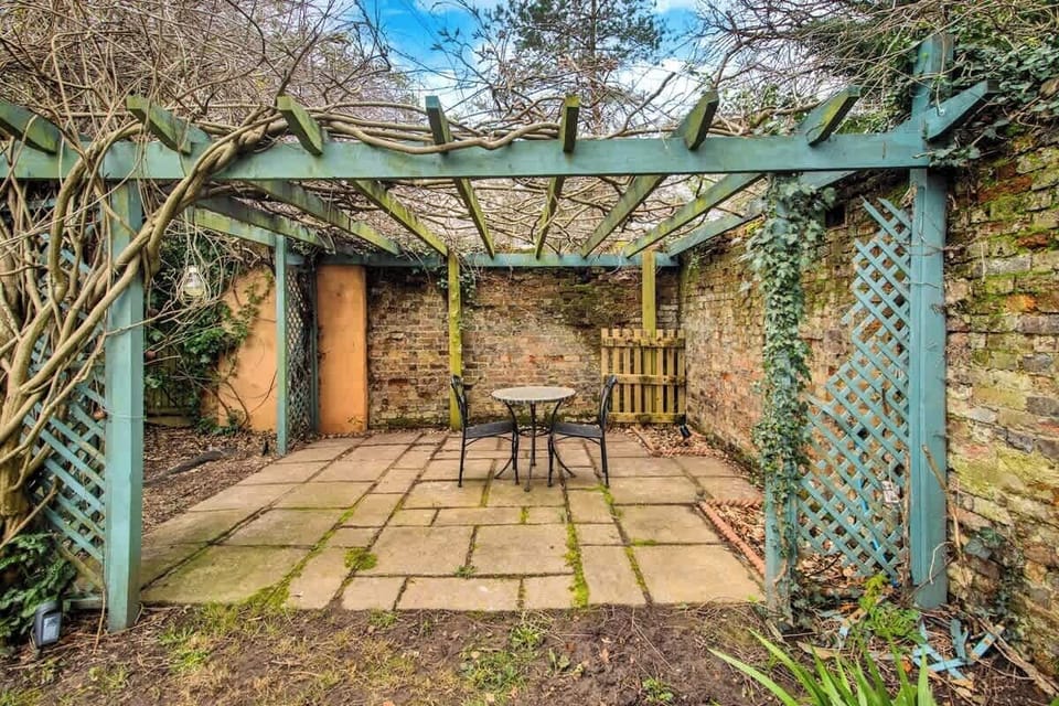 Outside courtyard seating with walled garden