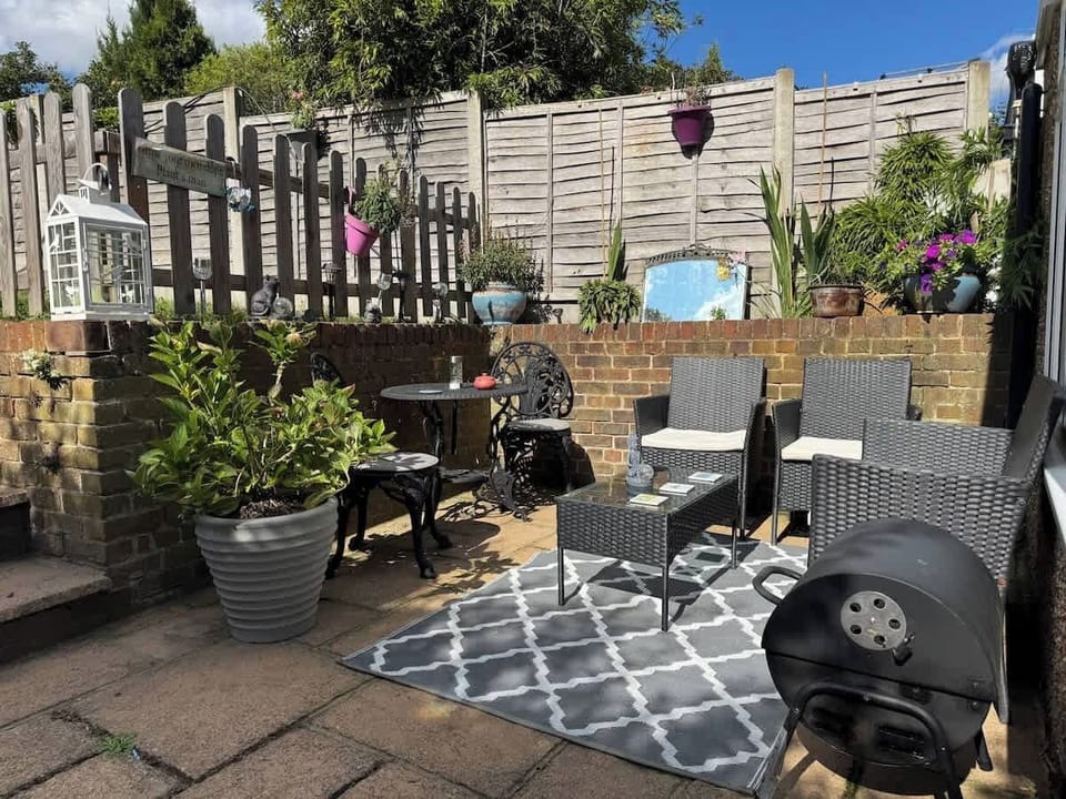 Sunny patio area perfect for entertaining and enjoying the sunshine.  BBQ available as shown.