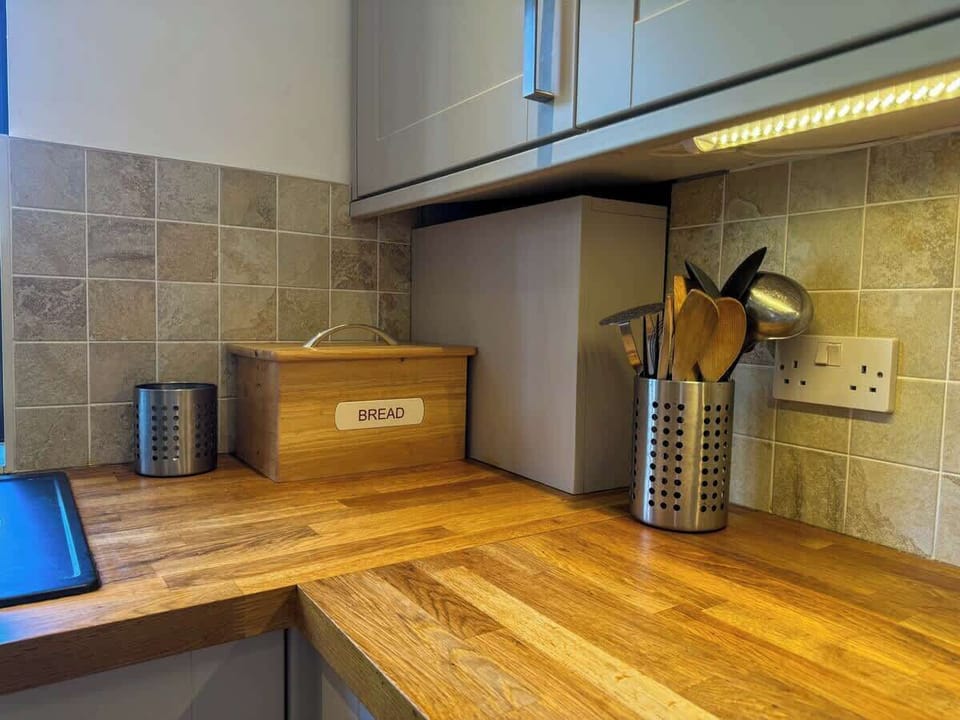 From prep to cleanup, this kitchen with fresh dishes ready to go makes every meal a breeze.