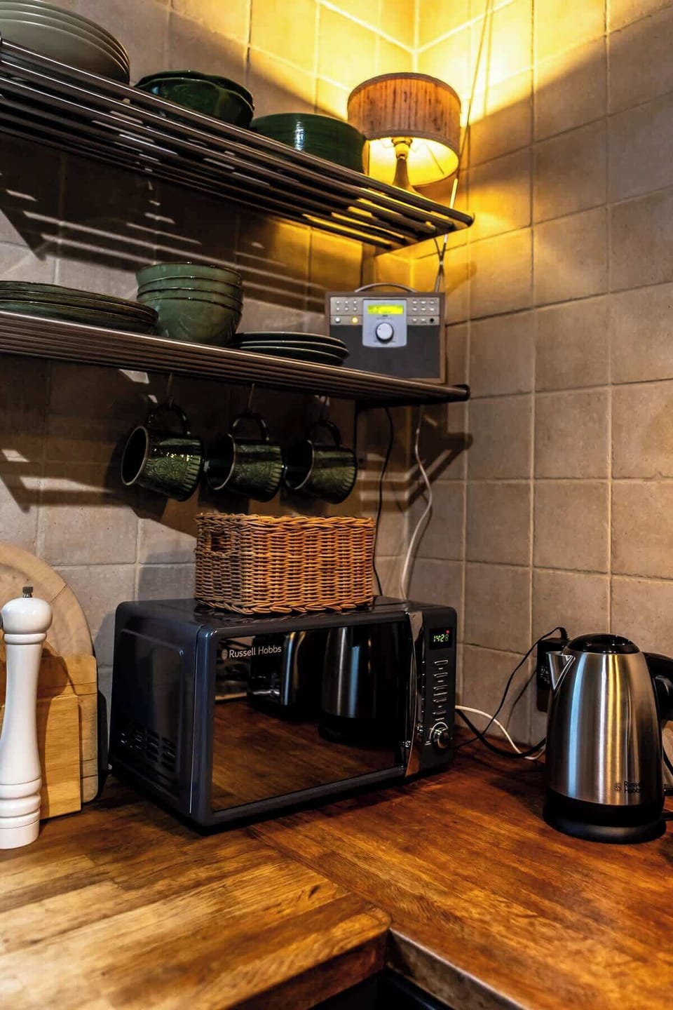Kitchen with all dishes, oven, and kettle for your convenience.