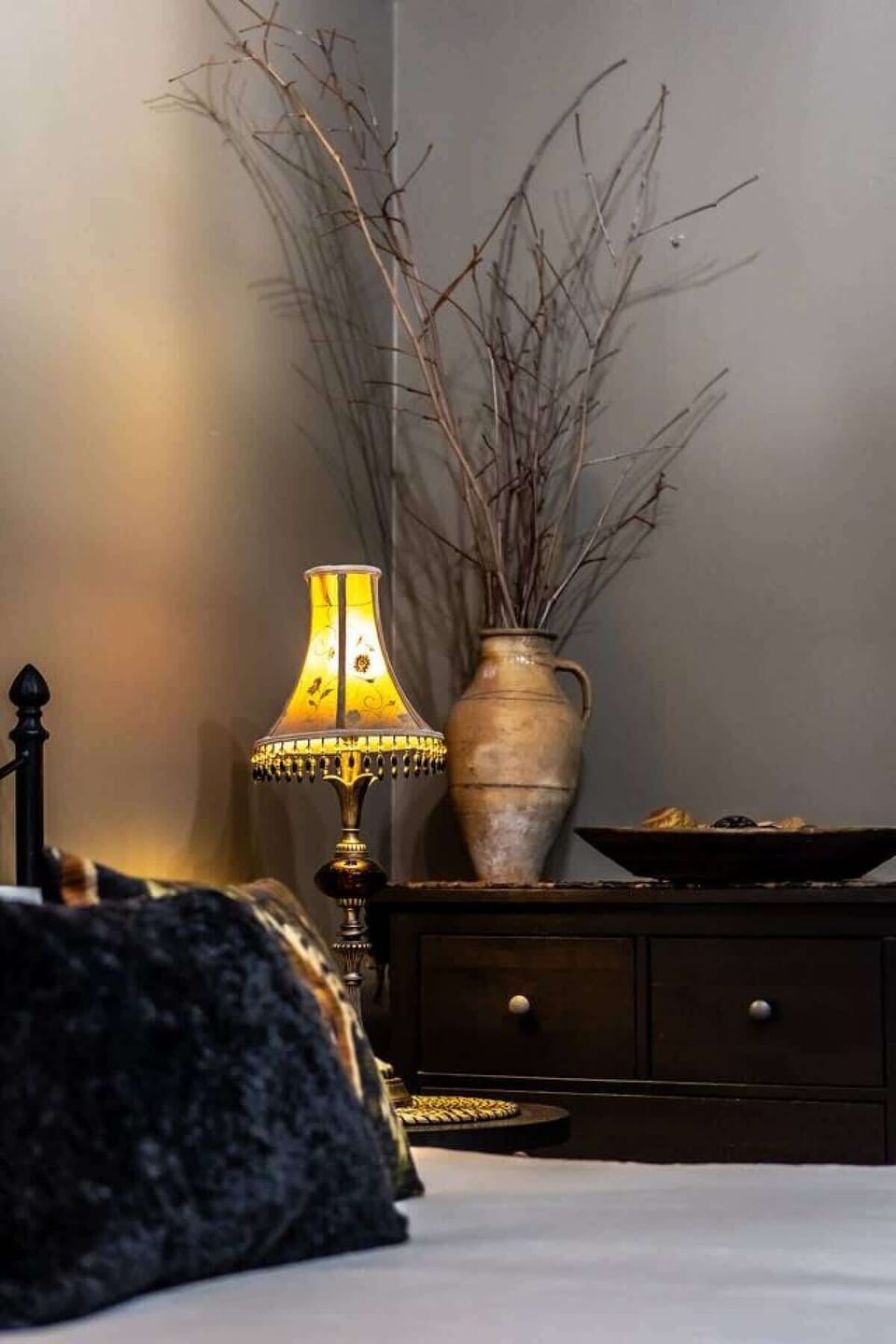 A lamp with side of the bedroom.