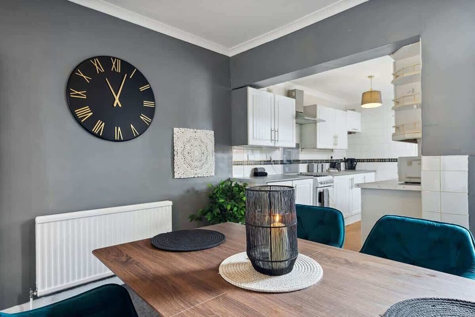 A dining area with a table and chairs, perfect for enjoying meals and spending quality time together.

