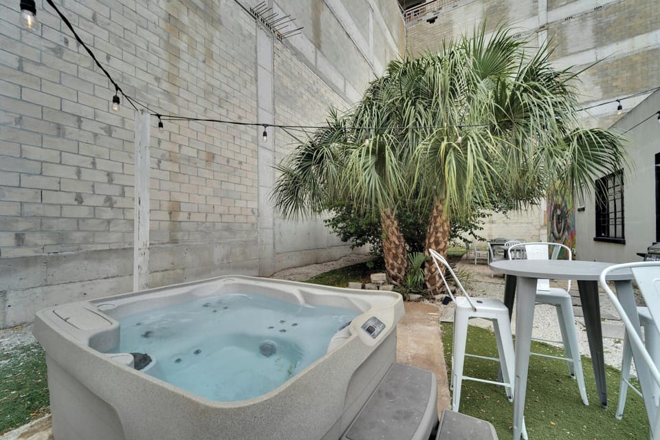 Relax in the cozy outdoor shared hot tub.

