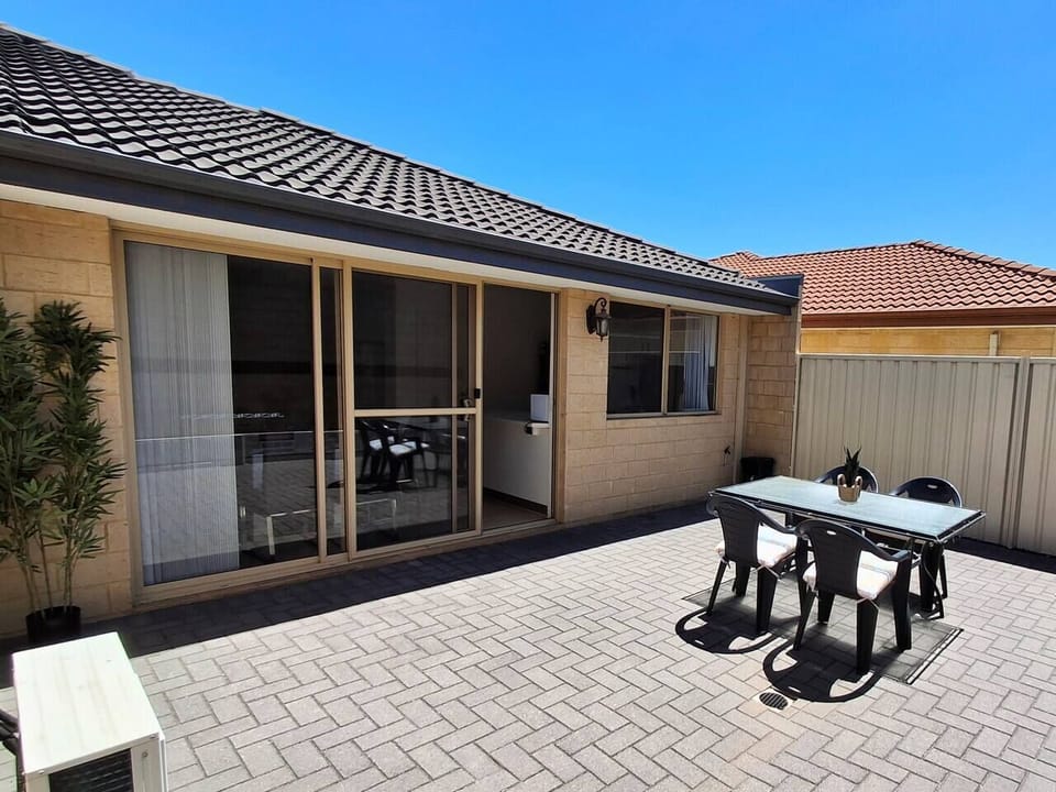 Breathe in the fresh air in the spacious backyard and savour your morning coffee under open blue skies.