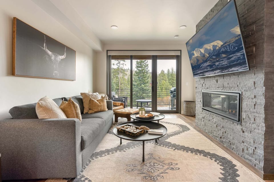Living Area with Balcony Access and Fireplace