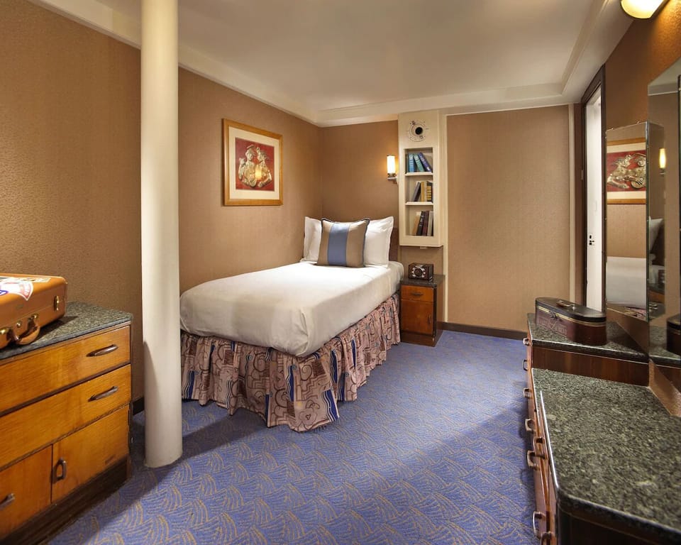 Recharge in a quiet single room designed for restful sleep.