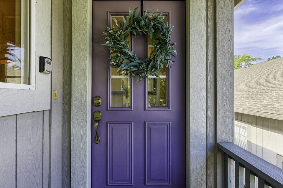 Front door with keypad lock for self check-in