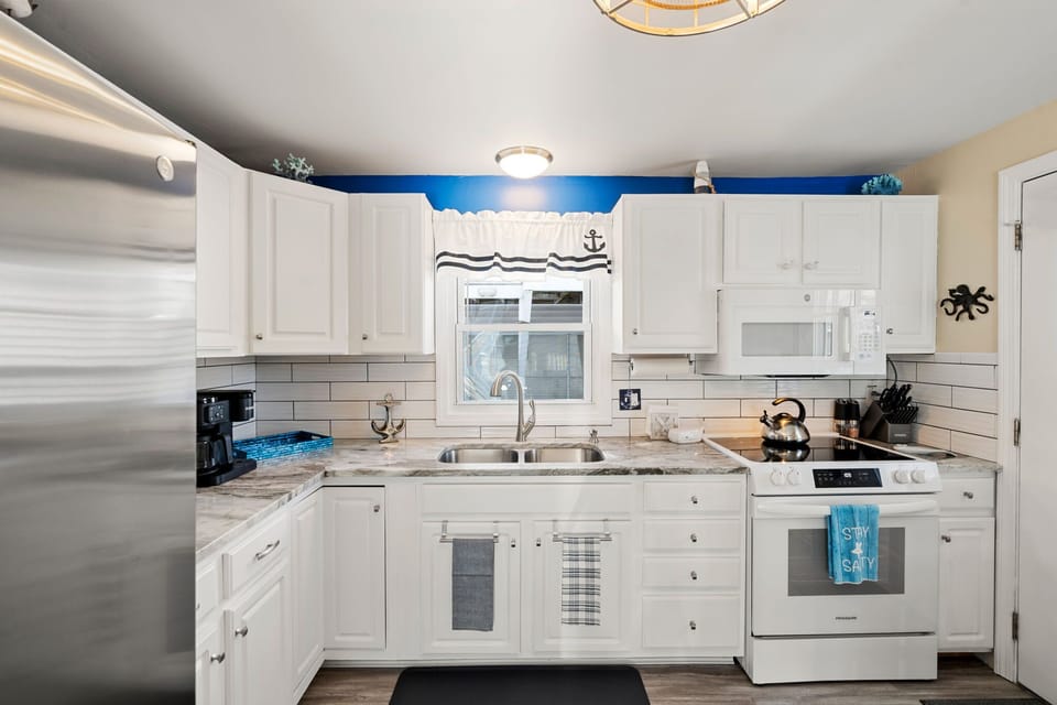 Fully equipped kitchen with updated appliances