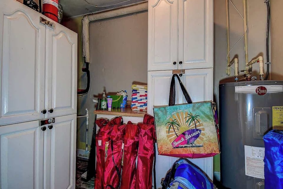 Everything you need, neatly stored!  From extra supplies to beach essentials, this space keeps your stay hassle-free. #StayOrganized #VacationReady