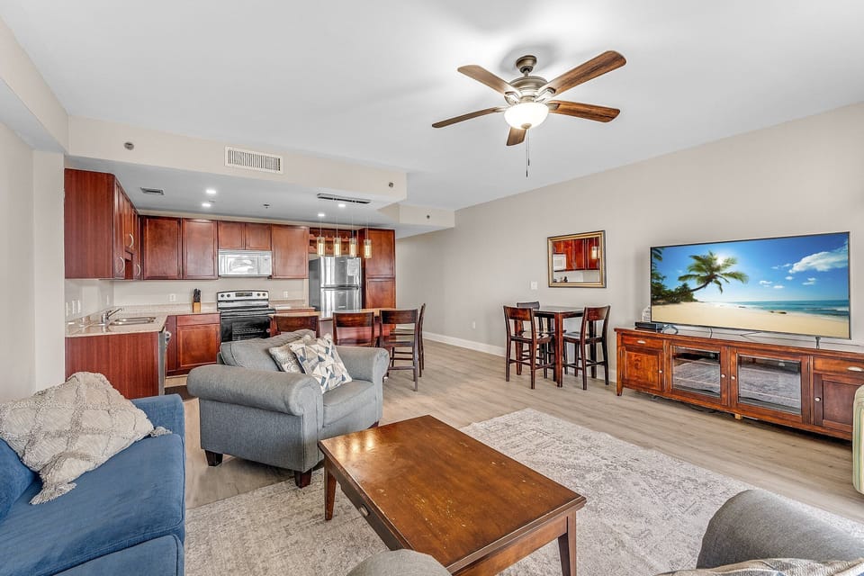 open-concept living area with modern kitchen and dining space