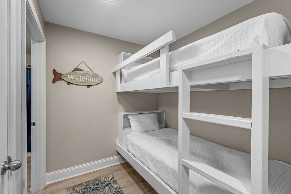 Cozy bunk bed setup in a compact, modern room.