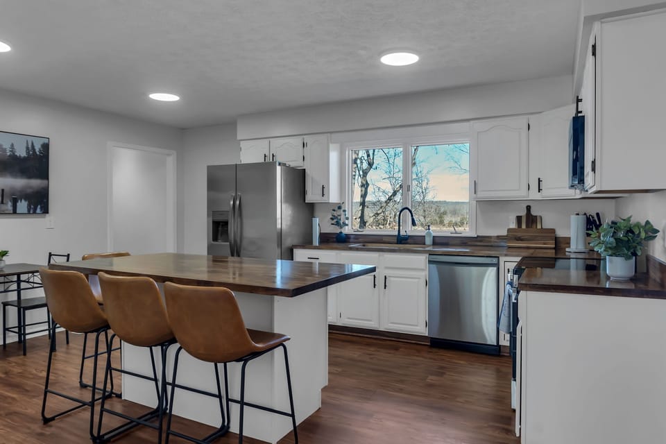 Our kitchen is outfitted with brand new stainless steel appliances. 