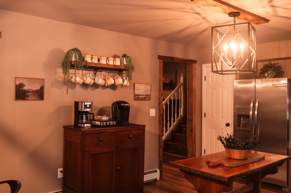 Antique coffee bar with drip and Keurig options. Complimentary pods provided.