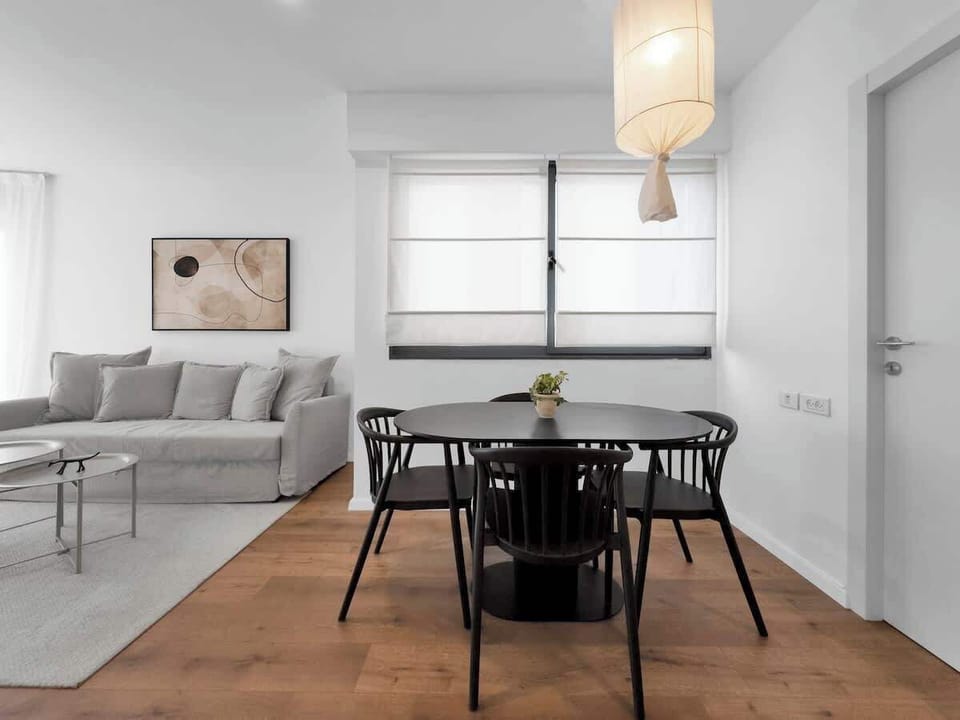 Start your mornings with coffee or wind down with a simple dinner in this cozy dining space.