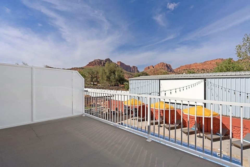 View from balcony: overlooks backyard & the south side of the Zion mountains 