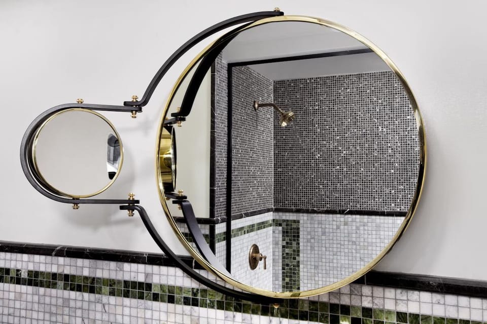 Admire the elegant mirror and luxe finishes before heading out.