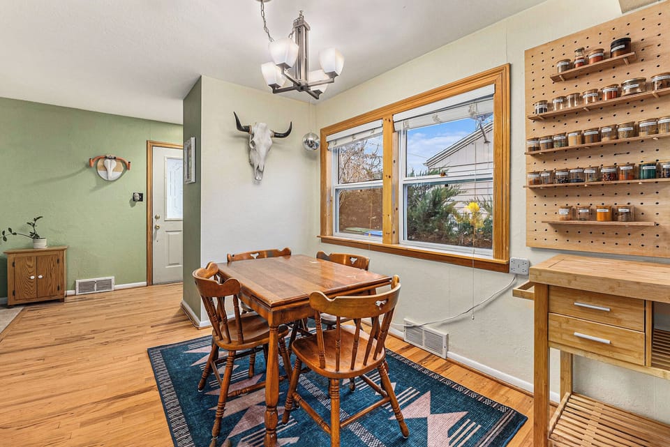 Kitchen table for meals and a spice rack with 52 spices