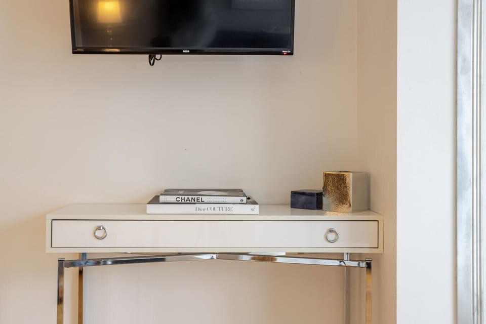 Elegant console with reading nook and TV.
