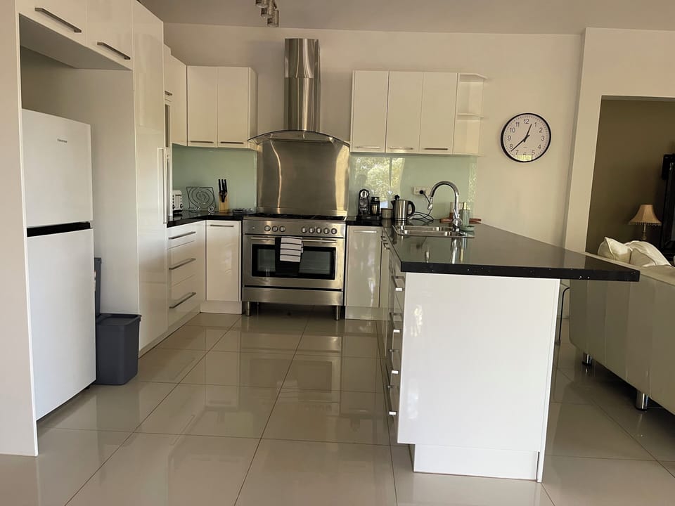 Fully equipped kitchen, complete with gas oven, microwave, dishwasher, fridge