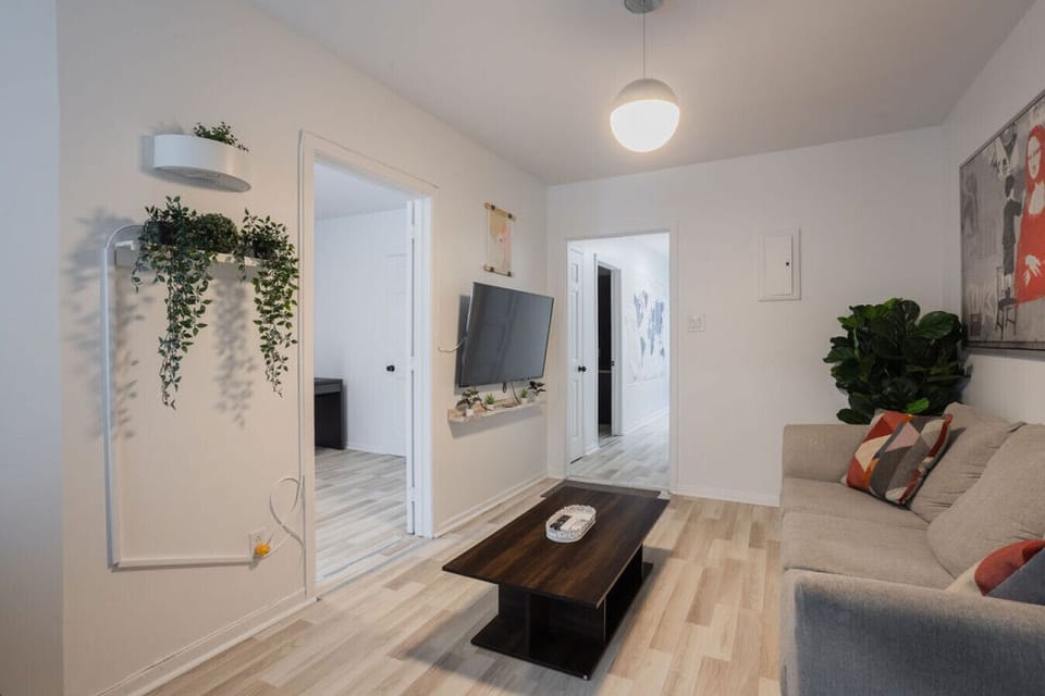 Another view showcases airy design, lush greenery, and a welcoming layout—perfect for relaxing or entertaining