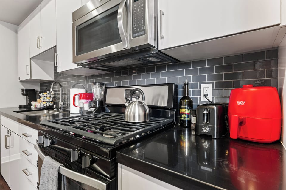 Full kitchen, air fryer, dishware, baking equipment, pots and pans, and more