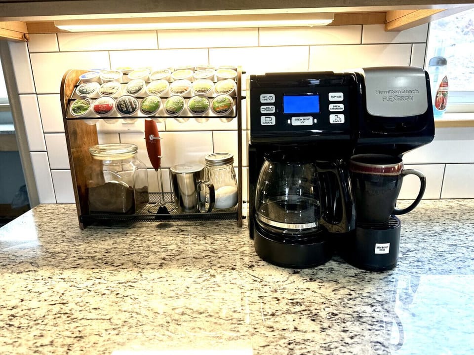 Coffee Maker has provided K-Cups, Coffee Grounds, sugar and creamer