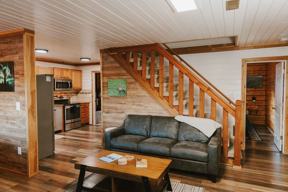 Relax and unwind in the living room with a large Smart TV, comfy seating, and high-speed internet.