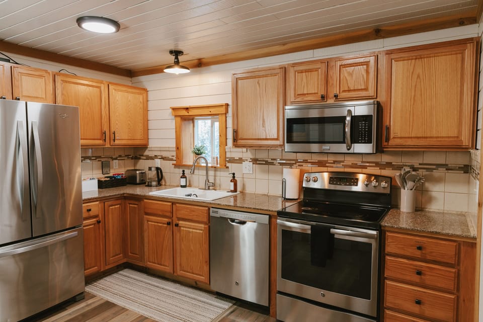 Fully stocked kitchen with coffee, cocoa, water, snacks, cooking spices and more!